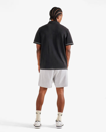 Malbon Fairway Overdyed Polo - Black on model back