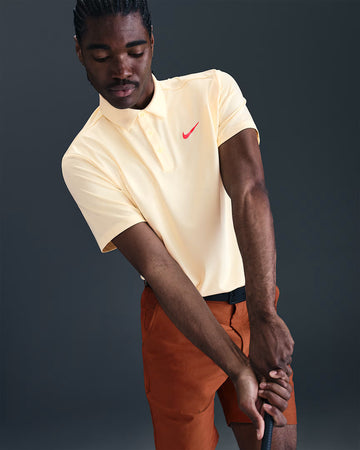 Nike Tour Men's Dri-FIT Solid Golf Polo - Muslin/Bright Crimson